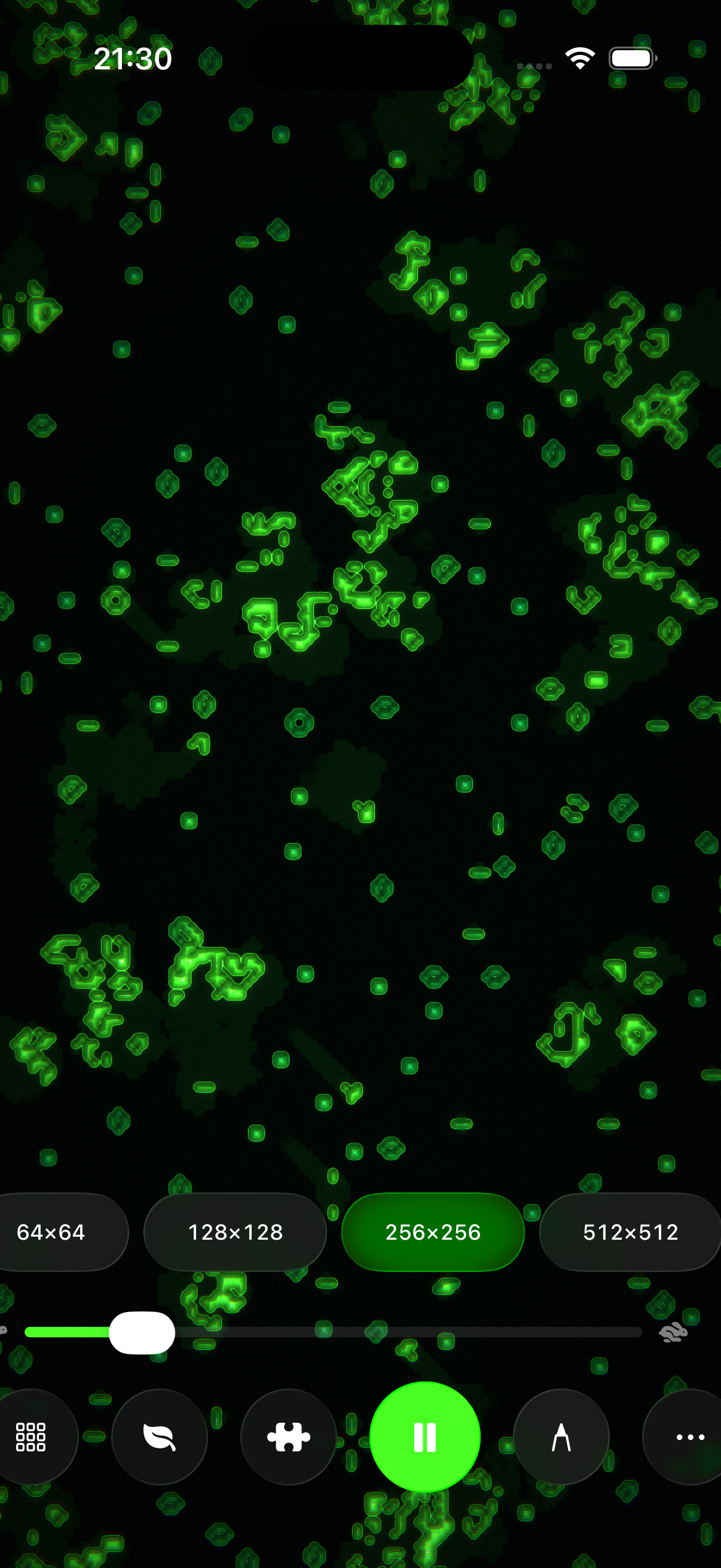 Vivarium app screenshot showing organic green cells under microscope-style rendering